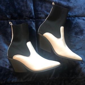 White and black western style sock booties.